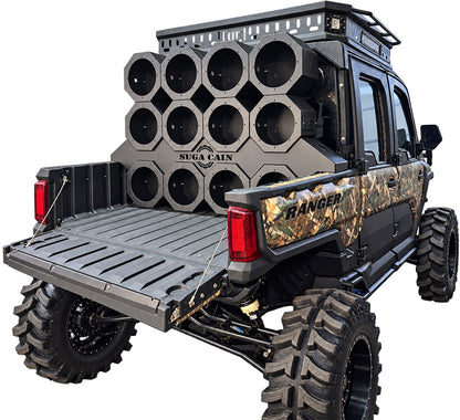 Empty Polaris Ranger 1500 stunt wall with 12 empty 10 inch tower cans and tower bar