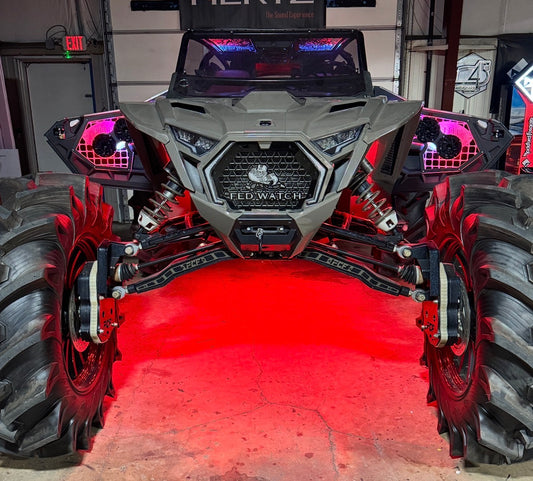Polaris RZR Pro custom door pods installed with illuminated acrylic and red lighting